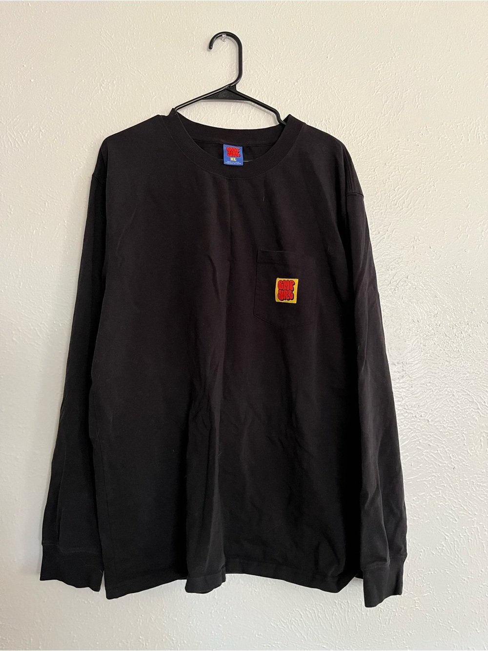 Empyre Black Long Sleeve Pocket Tee with Red and Yellow Patch